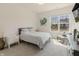 Bright bedroom with large window and neutral decor offers a serene and inviting space at 15755 Scher Dr, Westfield, IN 46074