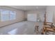 Bonus room with large window, neutral carpet, and built in Murphy bed at 15755 Scher Dr, Westfield, IN 46074