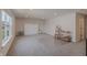 Bonus room with large window, neutral carpet, and built in Murphy bed at 15755 Scher Dr, Westfield, IN 46074