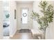 Inviting entryway with a bench and view of a bedroom at 15755 Scher Dr, Westfield, IN 46074
