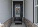 Stylish front door with a decorative wreath and welcoming entryway at 15755 Scher Dr, Westfield, IN 46074