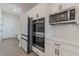Gourmet kitchen with stainless steel appliances, quartz countertops and ample storage at 15755 Scher Dr, Westfield, IN 46074