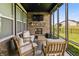 Outdoor seating area with brick fireplace offering relaxation and enjoyment with views of the lawn, backyard, and blue sky at 15755 Scher Dr, Westfield, IN 46074