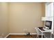 Comfortable bedroom setting with a well-lit workspace and a window view at 1630 Valdarno Dr, Greenwood, IN 46143