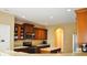 A kitchen view shows wood cabinets, an electric range, and granite countertops at 1630 Valdarno Dr, Greenwood, IN 46143