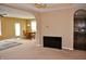 Spacious living room with access to dining and kitchen area and beige carpeting at 1630 Valdarno Dr, Greenwood, IN 46143