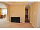 Cozy living room with carpeting, easy access to kitchen and dining areas, and comfortable design at 1630 Valdarno Dr, Greenwood, IN 46143