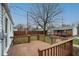 Spacious wood deck overlooking the backyard and detached garage, perfect for outdoor entertaining at 1957 N Colorado Ave, Indianapolis, IN 46218
