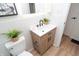 Modern bathroom with a stylish vanity, neutral tones, and ample lighting at 1957 N Colorado Ave, Indianapolis, IN 46218