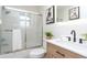 Well-lit bathroom with a modern vanity, shower, and stylish decor at 1957 N Colorado Ave, Indianapolis, IN 46218