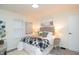 Serene bedroom with neutral tones, soft lighting, and a cozy atmosphere at 1957 N Colorado Ave, Indianapolis, IN 46218