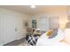 Comfortable bedroom with a queen bed, stylish decor, and soft lighting at 1957 N Colorado Ave, Indianapolis, IN 46218