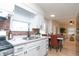 Bright eat-in kitchen featuring modern cabinetry, countertops and an open floor plan at 1957 N Colorado Ave, Indianapolis, IN 46218