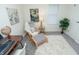 Cozy office space with plush rug, comfortable chair, and bright natural light at 1957 N Colorado Ave, Indianapolis, IN 46218