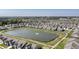 Aerial view of the community showcasing a pond and well-maintained homes at 19771 Sutton Ter, Westfield, IN 46074