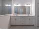 Well-lit bathroom with dual vanity and modern fixtures at 19771 Sutton Ter, Westfield, IN 46074