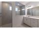 Sleek bathroom featuring a tiled shower and ample vanity space at 19771 Sutton Ter, Westfield, IN 46074