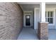 Welcoming front porch with a stylish front door, offering a warm entry to the home at 19771 Sutton Ter, Westfield, IN 46074