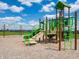 Community playground with climbing frames and swings, ideal for active play and neighborhood fun at 221 Ames Dr, Whiteland, IN 46184