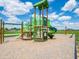 Community playground featuring a slide, climbing area, and a swing set at 231 Ames Dr, Whiteland, IN 46184