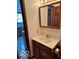 Small bathroom with a wood-toned vanity and recessed lighting at 2359 S County Road 1050 E, Indianapolis, IN 46231