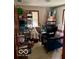 Cluttered bedroom with boxes, furniture, and playpen at 2359 S County Road 1050 E, Indianapolis, IN 46231