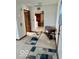 Bright entryway with carpeted floors and access to the kitchen at 2359 S County Road 1050 E, Indianapolis, IN 46231