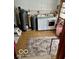 Small laundry room with washer and dryer, storage and tile flooring at 2359 S County Road 1050 E, Indianapolis, IN 46231