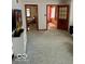 Living room with gray carpet and multiple doorways leading to other rooms at 2359 S County Road 1050 E, Indianapolis, IN 46231