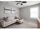 Relaxing bedroom with plush carpet, neutral decor, and ample natural light at 2618 Congress St, Carmel, IN 46032