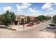 Exterior view of restaurants and shops along street with metered parking at 2618 Congress St, Carmel, IN 46032