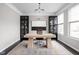 Stylish home office features modern desk, designer rug, and built-in bookcases at 2618 Congress St, Carmel, IN 46032