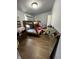 A cozy bedroom featuring a wooden bunk bed, wood flooring, and natural light at 2627 Chase St, Anderson, IN 46016
