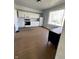 Bright kitchen featuring white cabinets, ample counter space, and modern appliances; ready for cooking and entertaining at 2627 Chase St, Anderson, IN 46016