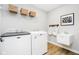 The laundry room is set up with both a washing machine and dryer at 3246 Fawn Cir, Brownsburg, IN 46112