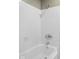 Bathroom features a white tiled shower and bathtub combo at 3407 Allison Ave, Indianapolis, IN 46224