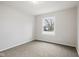 Bedroom with neutral carpet, large window, and white walls at 3407 Allison Ave, Indianapolis, IN 46224