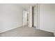 Bedroom with neutral carpet, closet with folding doors, and white walls at 3407 Allison Ave, Indianapolis, IN 46224