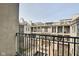 The property features a charming balcony with outdoor seating overlooking the meticulously landscaped courtyard at 355 E Ohio St # 310, Indianapolis, IN 46204