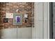 Modern secured entryway with brick and stone accents, featuring a ButterflyMX system for convenient access at 355 E Ohio St # 310, Indianapolis, IN 46204