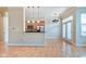 Kitchen with stainless steel appliances, breakfast bar, and hardwood floors at 355 E Ohio St # 310, Indianapolis, IN 46204