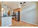 Spacious kitchen boasts stainless appliances, granite countertops, and wood cabinets at 355 E Ohio St # 310, Indianapolis, IN 46204