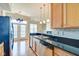 Well-lit kitchen showcasing stainless steel appliances and granite countertops at 355 E Ohio St # 310, Indianapolis, IN 46204