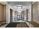 Inviting lobby featuring elegant lighting, decorative railings, and comfortable seating, creating a welcoming atmosphere at 355 E Ohio St # 310, Indianapolis, IN 46204