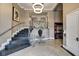 Luxurious lobby with modern decor, grand staircase, and elevator access, providing a sophisticated welcome at 355 E Ohio St # 310, Indianapolis, IN 46204