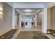 Bright building lobby with neutral colors, decorative lighting, and well appointed seating and decor at 355 E Ohio St # 310, Indianapolis, IN 46204