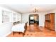 Inviting dining area with hardwood floors and natural light, perfect for Gathering meals and entertaining guests at 3559 Carrollton Ave, Indianapolis, IN 46205