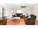 Inviting living room with hardwood floors, fireplace, and plenty of natural light at 3559 Carrollton Ave, Indianapolis, IN 46205