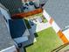 Aerial view of the backyard featuring a patio, seating, and green lawn at 358 Terrace Ave, Indianapolis, IN 46225