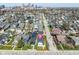 Aerial perspective showcasing home's placement amongst neighboring homes with downtown in the background at 358 Terrace Ave, Indianapolis, IN 46225